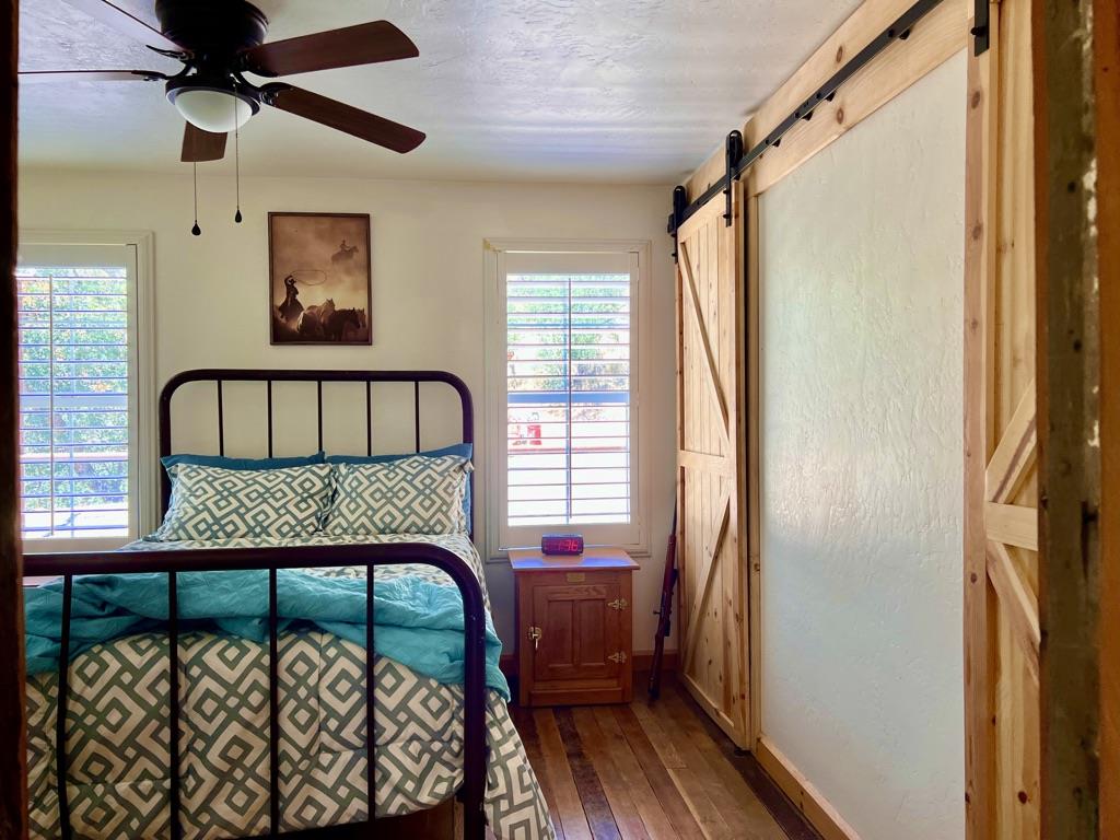 20505 Coalinga Road Paicines, CA 95043 - Photo 15 of 29 a bedroom with a bed and a window