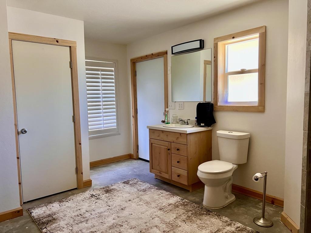 20505 Coalinga Road Paicines, CA 95043 - Photo 17 of 29 a room with a window and a table chair