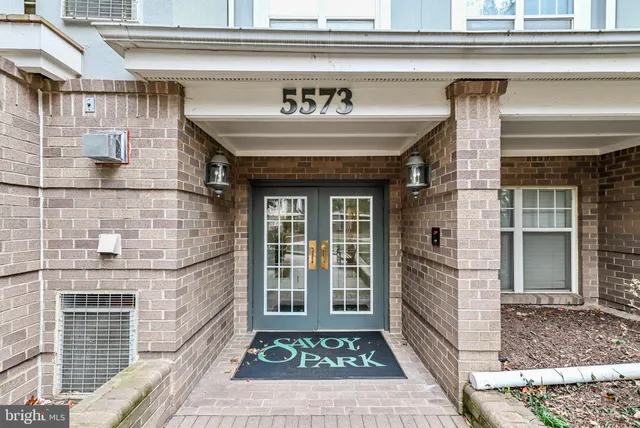 a front view of a building with a entryway