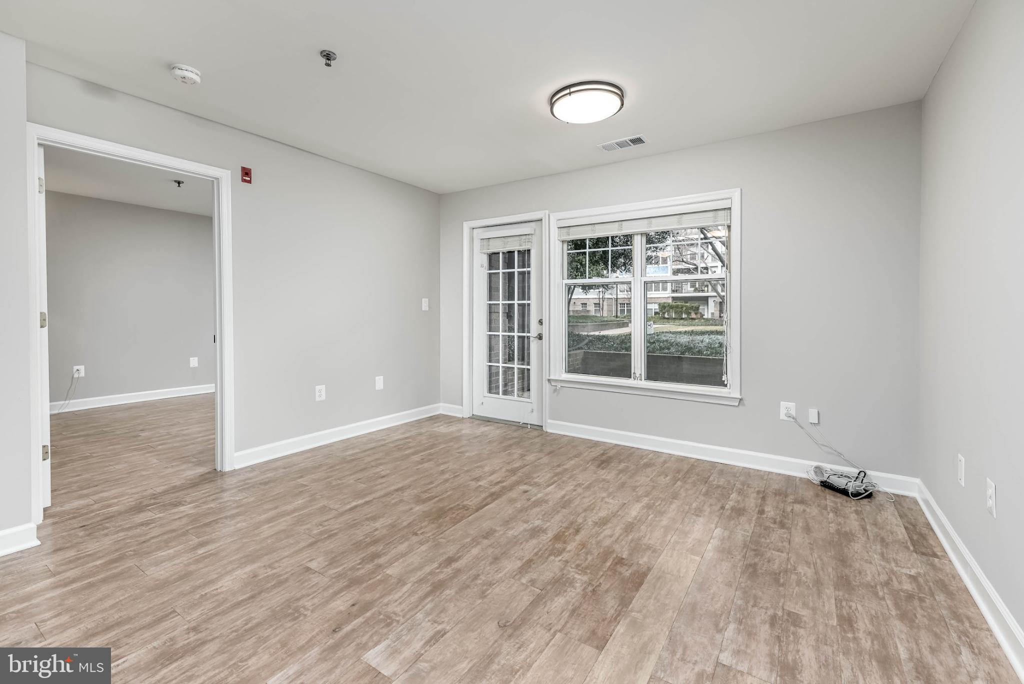5573 Seminary Road, Unit 115 Falls Church, VA 22041 - Photo 6 of 32 The living room is a bright and airy space.