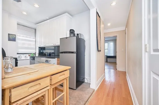 a kitchen with a stove and a microwave