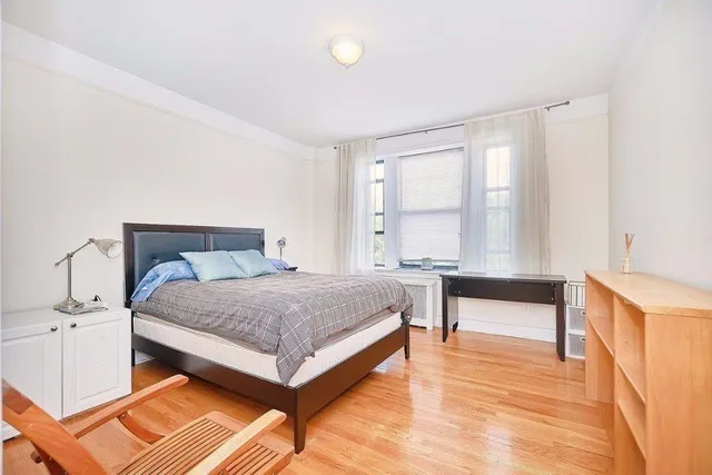 a workspace with furniture and wooden floor