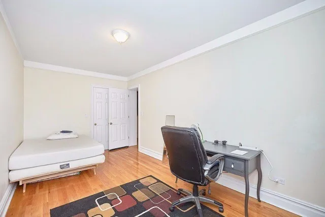 a view of a bedroom from a hallway