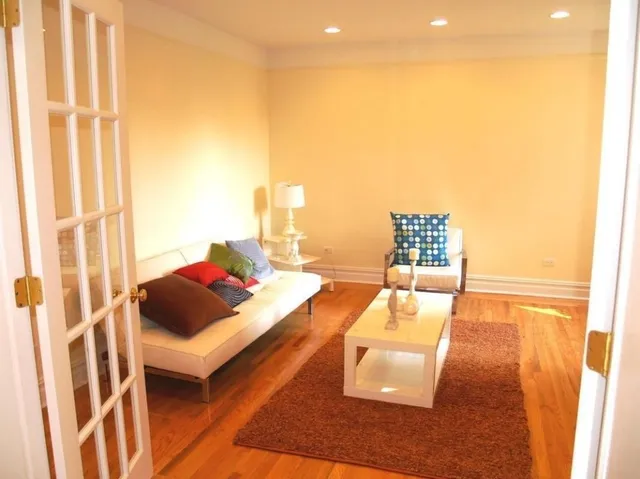 a living room with furniture and a couch