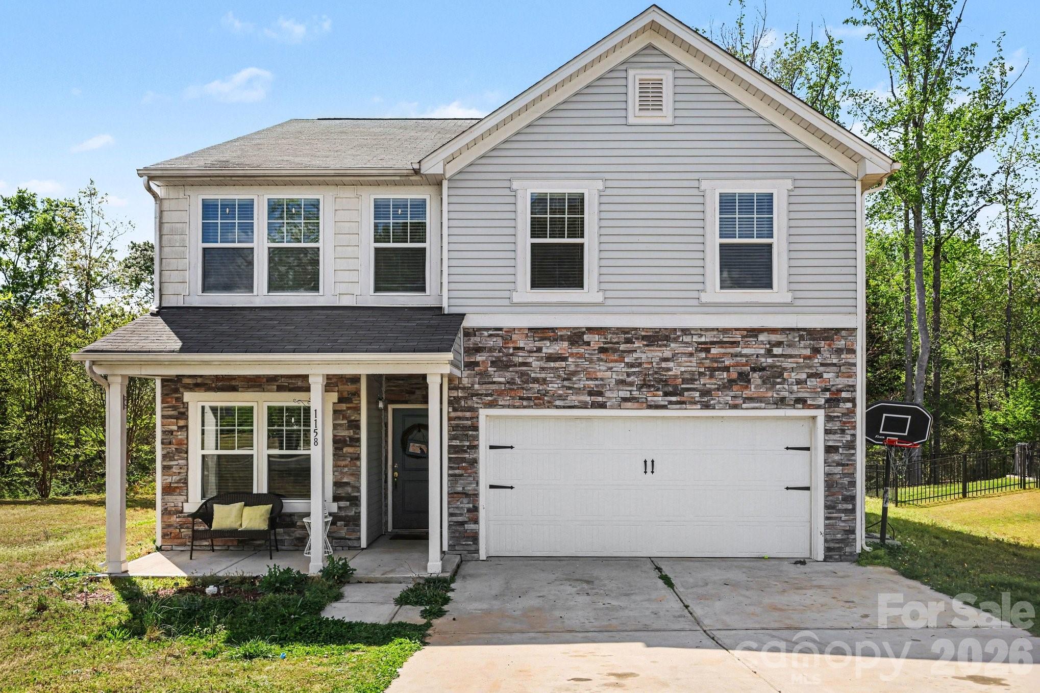 1158 Whitehall Hill Road York, SC 29745 - Photo 1 of 27 a front view of a house with garden