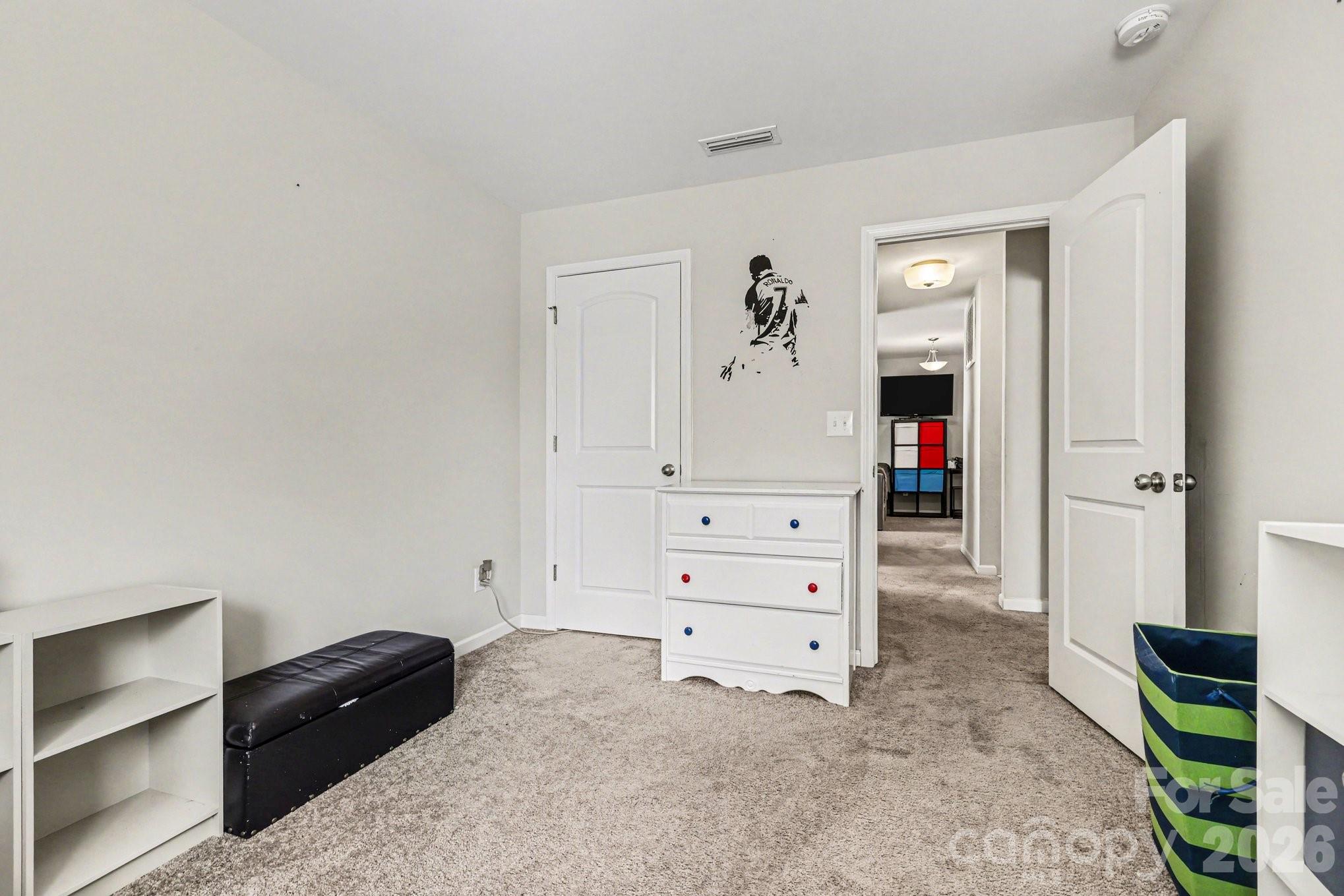 1158 Whitehall Hill Road York, SC 29745 - Photo 18 of 27 a bedroom with a bed and a dresser
