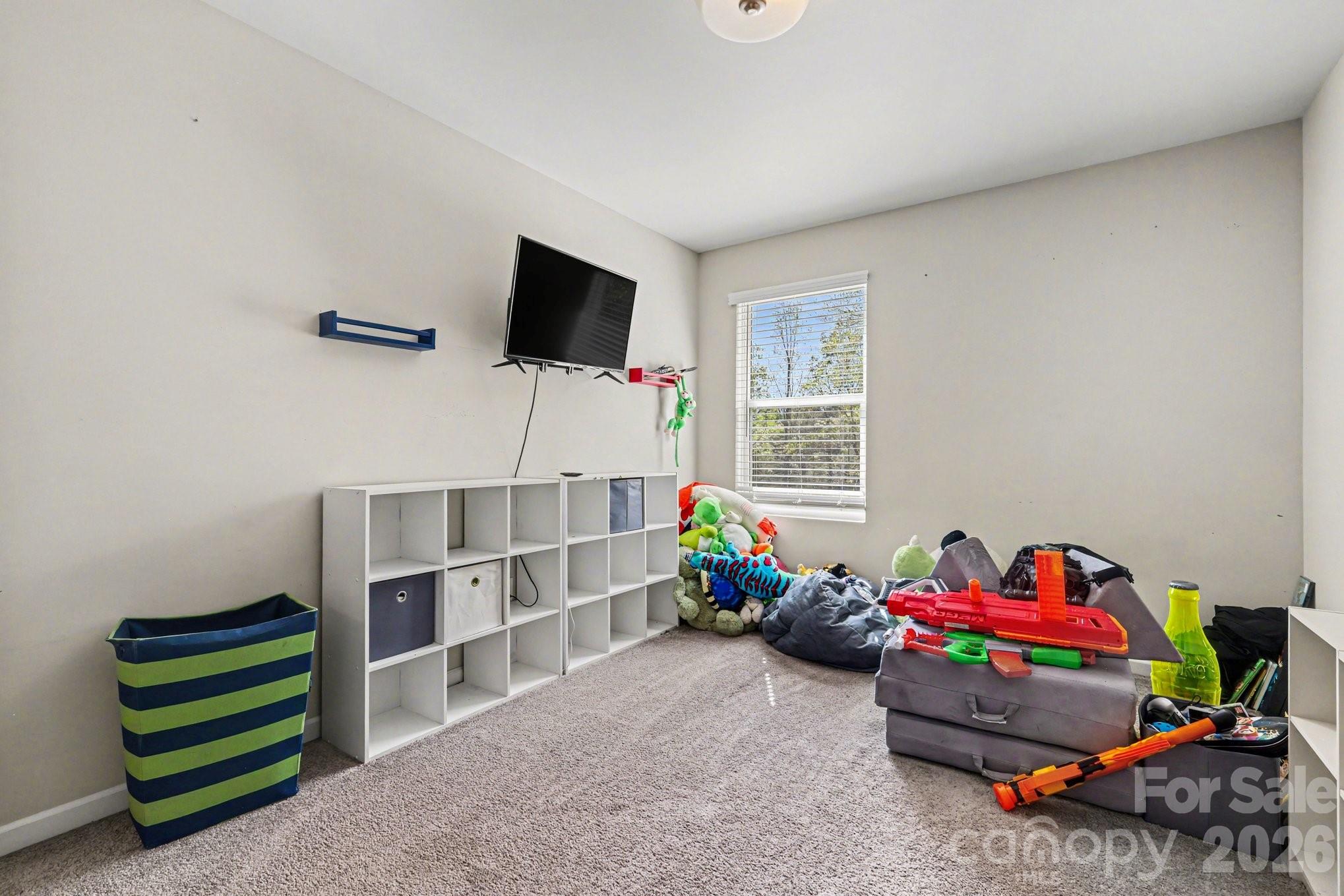 1158 Whitehall Hill Road York, SC 29745 - Photo 22 of 27 a living room with furniture and a flat screen tv
