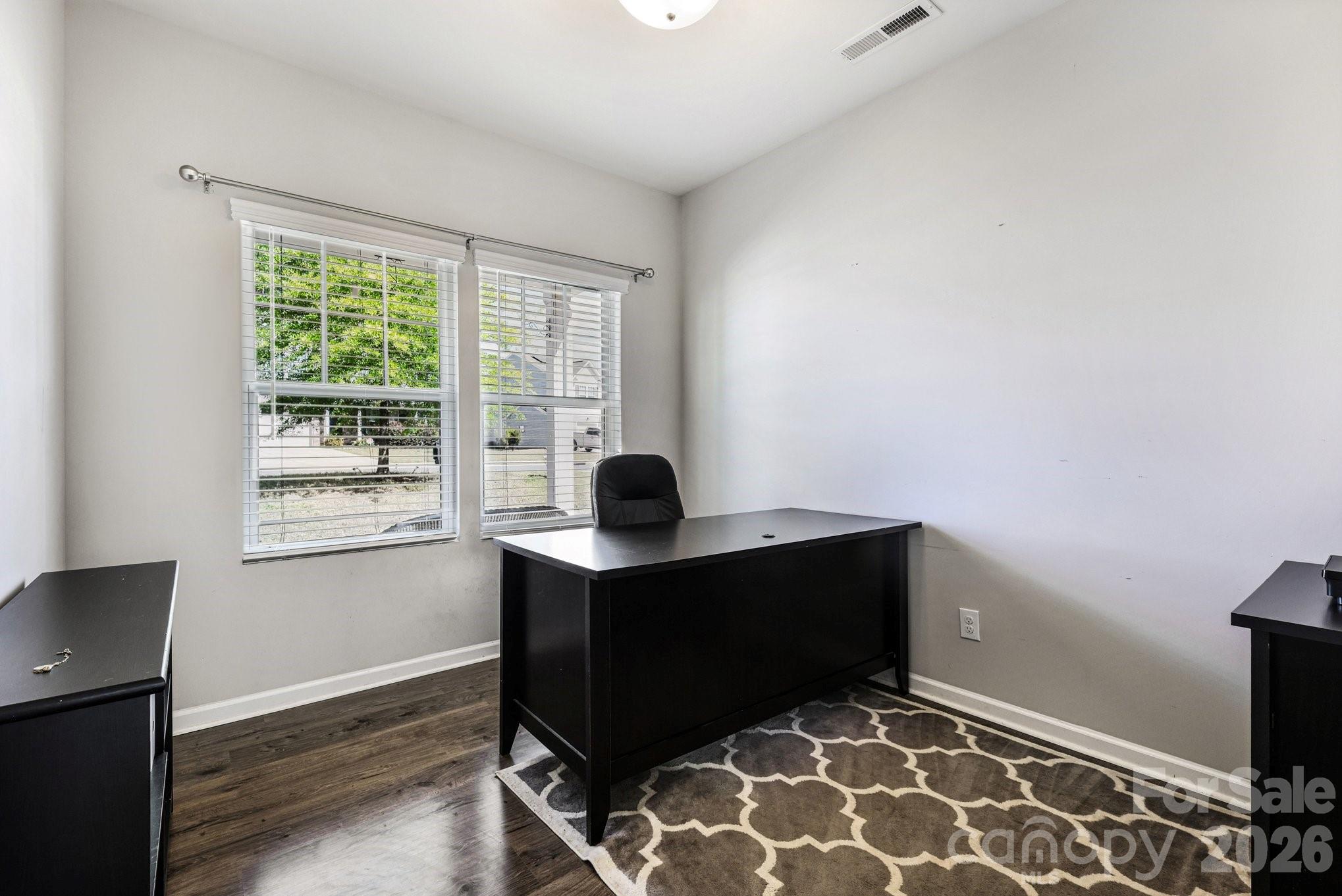 1158 Whitehall Hill Road York, SC 29745 - Photo 23 of 27 a view of workspace with wooden floor windows cabinet
