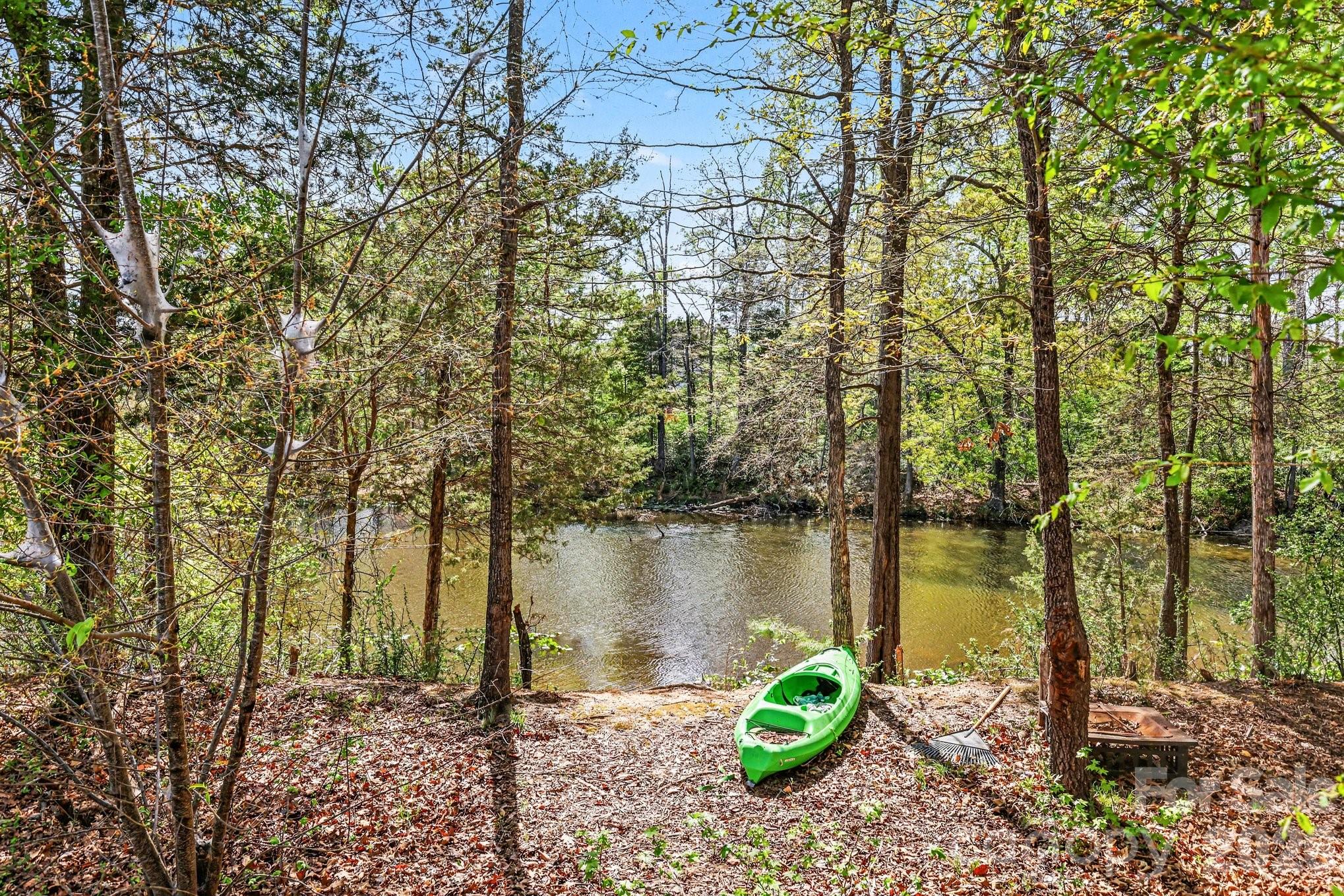 1158 Whitehall Hill Road York, SC 29745 - Photo 27 of 27 a view of a lake with a large trees