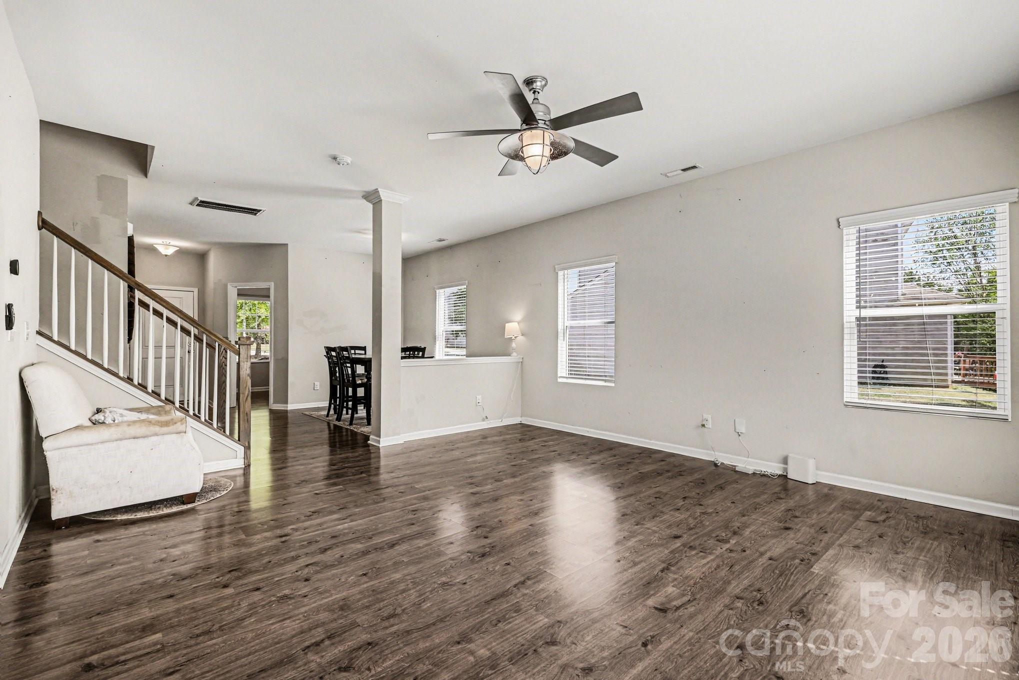 1158 Whitehall Hill Road York, SC 29745 - Photo 5 of 27 a view of an empty room with wooden floor and a window