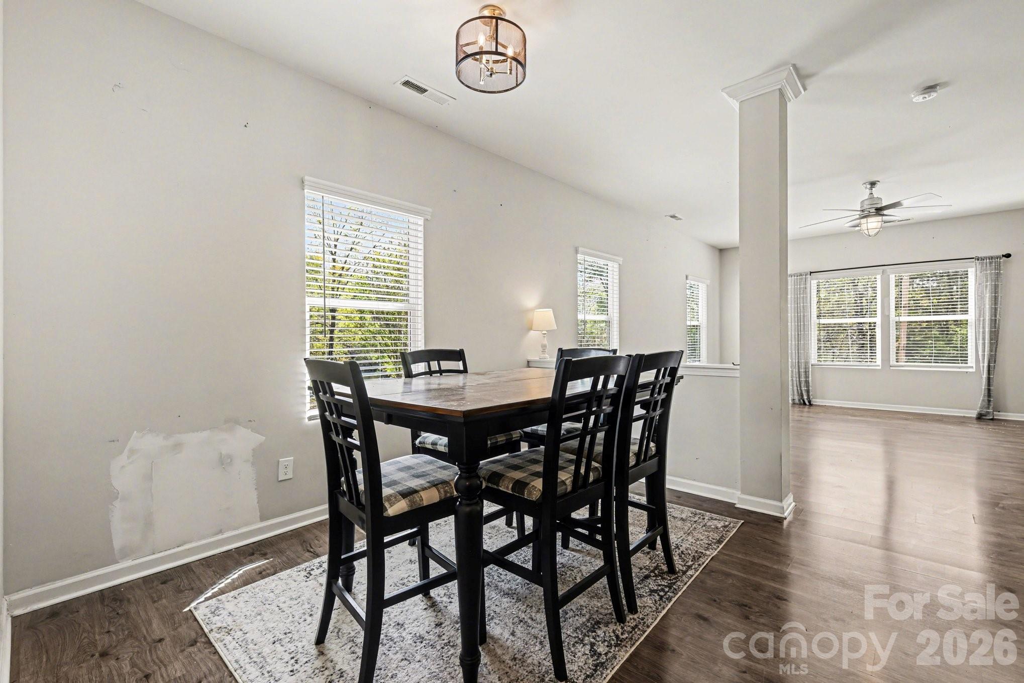 1158 Whitehall Hill Road York, SC 29745 - Photo 9 of 27 a view of a dining room with furniture window and wooden floor
