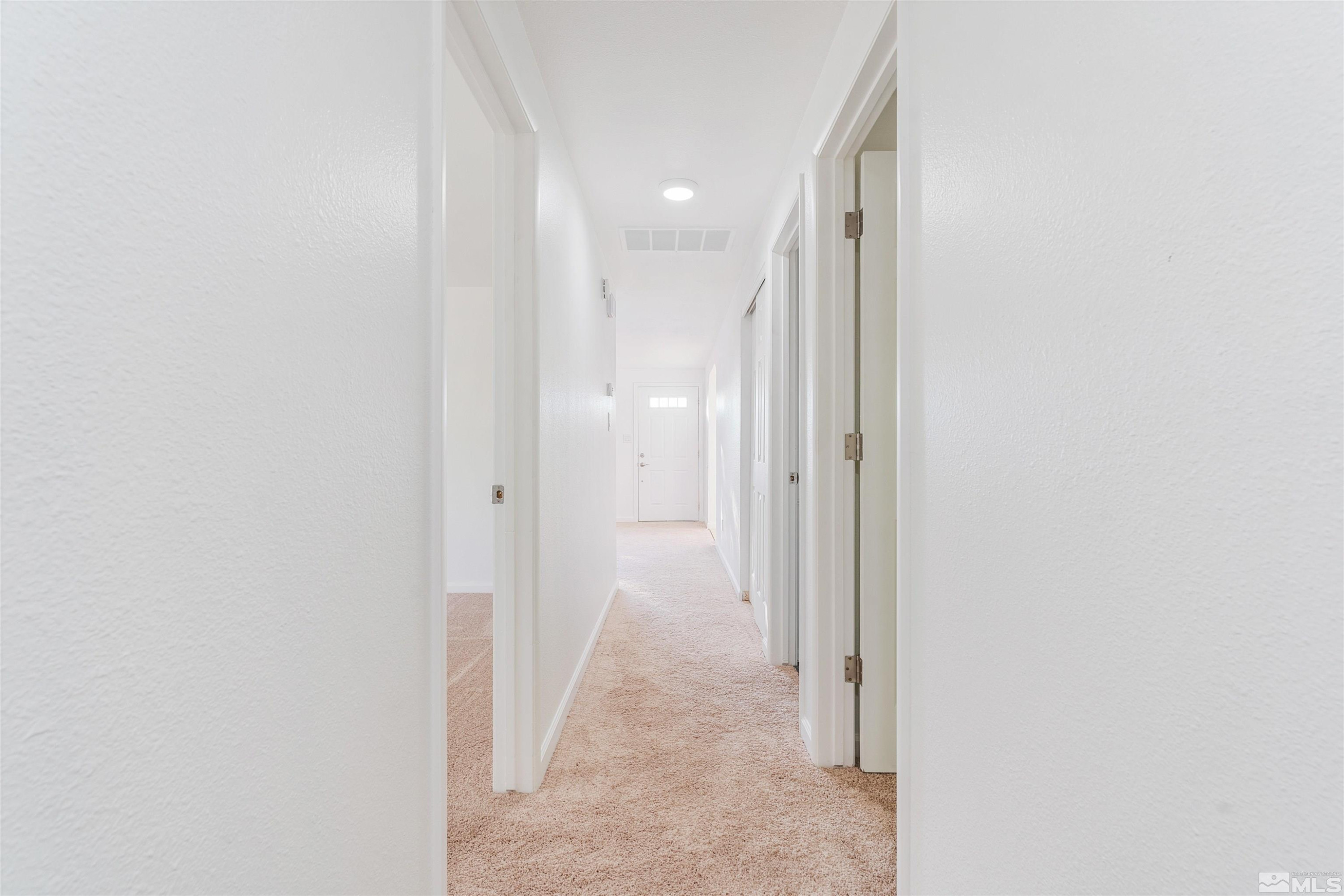 9360 Fremont Way Reno, NV 89506 - Photo 7 of 27 a view of a hallway