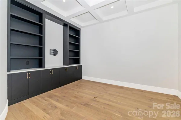 a room with cabinets and a window