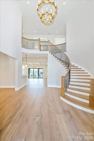 an entryway with wooden floor