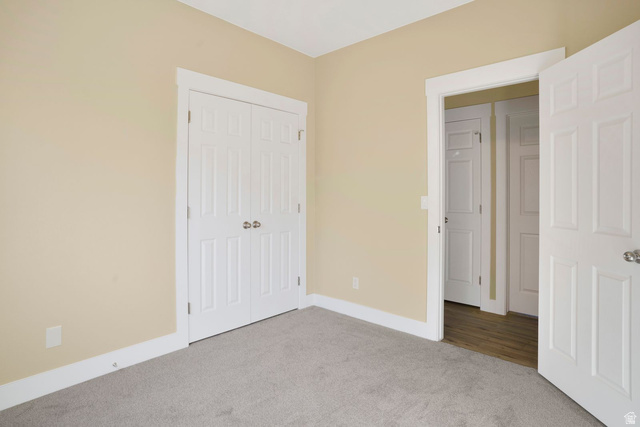 1570 South Rio Virgin Drive Washington, UT 84780 - Photo 47 of 71 Unfurnished bedroom featuring carpet floors and a closet
