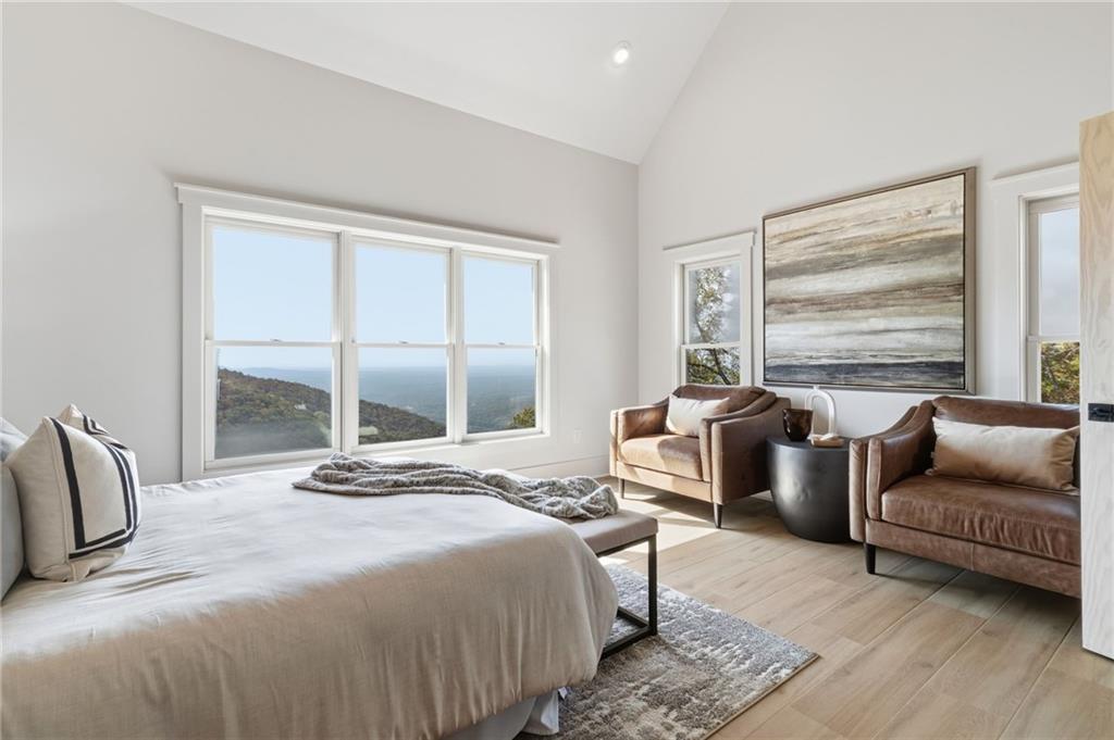 5510 Monument Road Jasper, GA 30143 - Photo 16 of 58 a bedroom with a bed and a couch