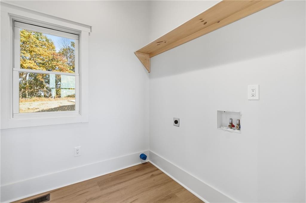 5510 Monument Road Jasper, GA 30143 - Photo 19 of 58 a view of room with window and wooden floor