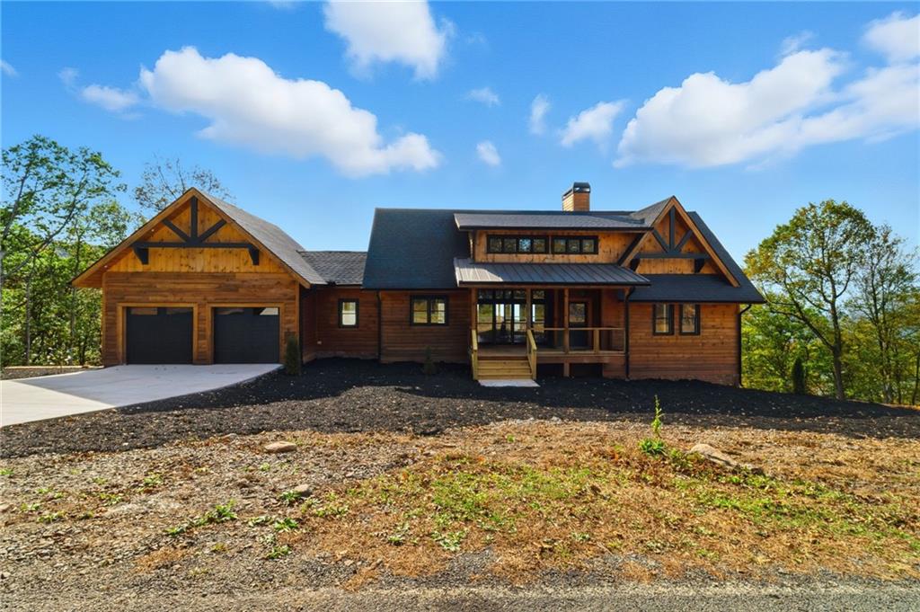 5510 Monument Road Jasper, GA 30143 - Photo 2 of 58 a view of a house with a yard