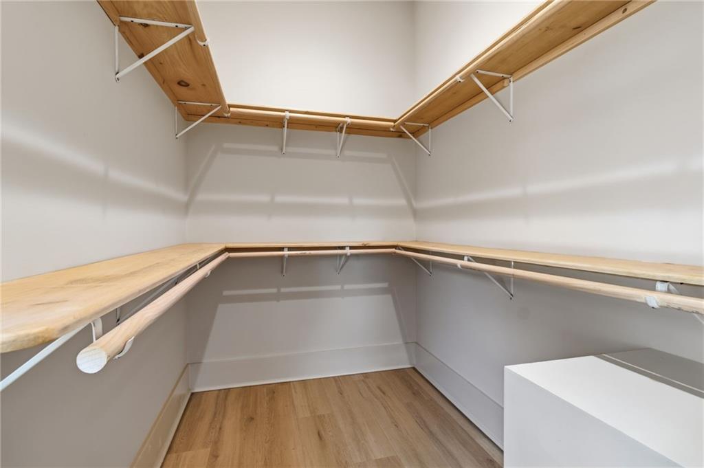 5510 Monument Road Jasper, GA 30143 - Photo 22 of 58 a view of walk in closet with empty racks