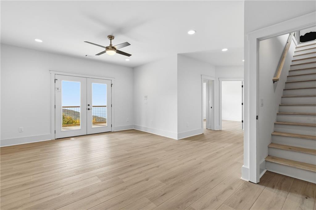 5510 Monument Road Jasper, GA 30143 - Photo 23 of 58 wooden floor in an empty room with a window
