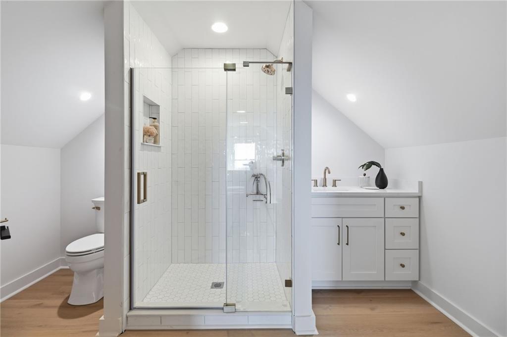 5510 Monument Road Jasper, GA 30143 - Photo 38 of 58 a bathroom with a sink a toilet and shower