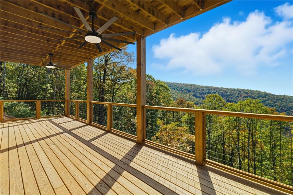 5510 Monument Road Jasper, GA 30143 - Photo 42 of 58 a view of a balcony with wooden floor