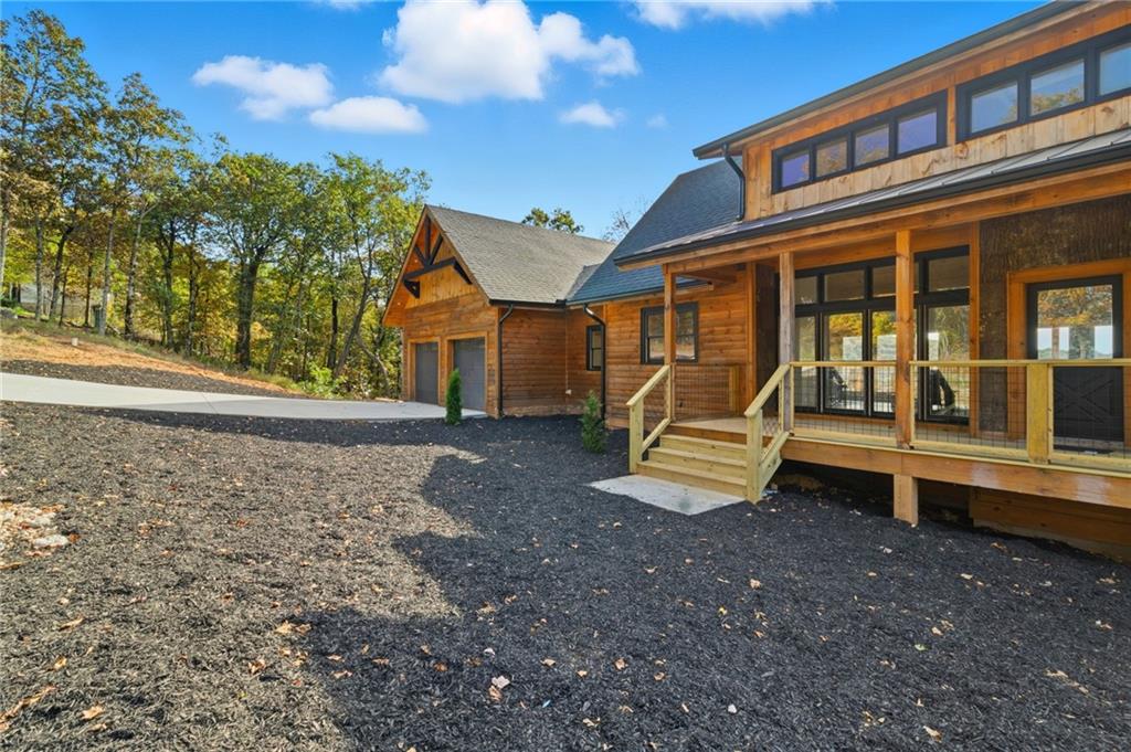 5510 Monument Road Jasper, GA 30143 - Photo 44 of 58 a view of a house with a yard