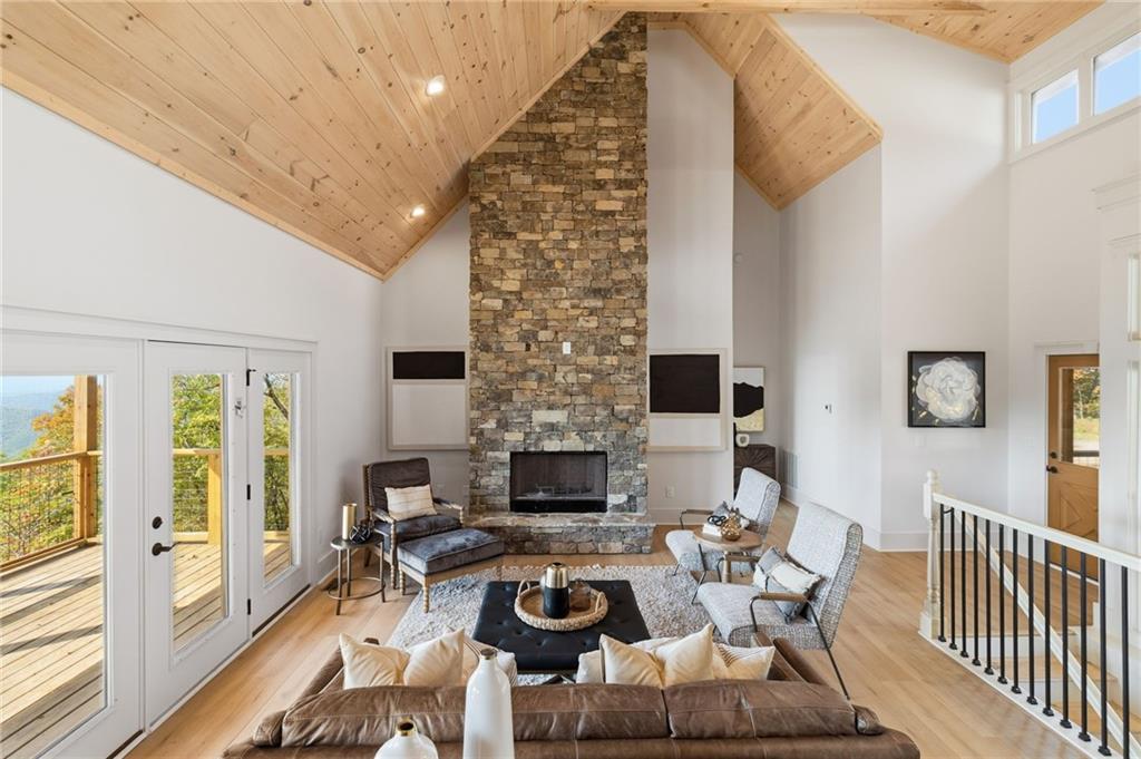 5510 Monument Road Jasper, GA 30143 - Photo 6 of 58 a living room with furniture fireplace and a large window