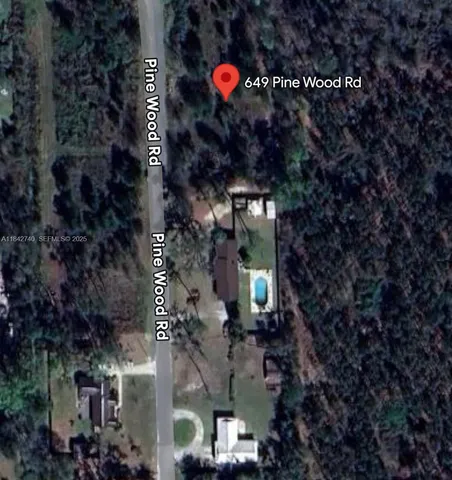 a street sign that is on a tree