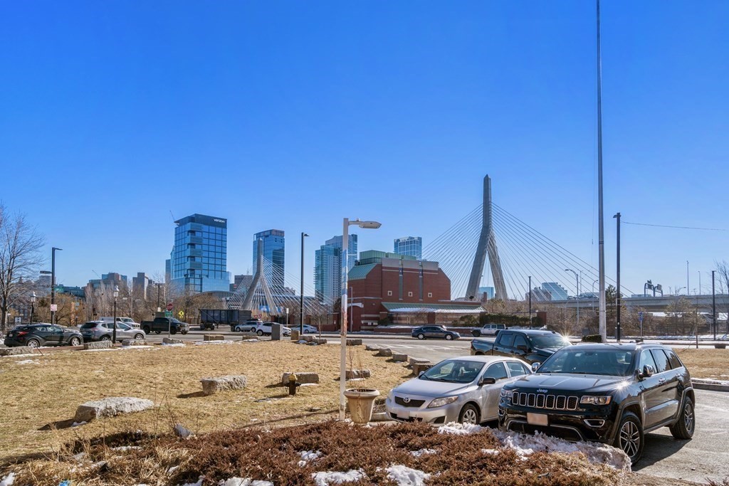 24 Harvard Street, Unit 4 Boston, MA 02129 - Photo 14 of 17 a view of a city with tall buildings