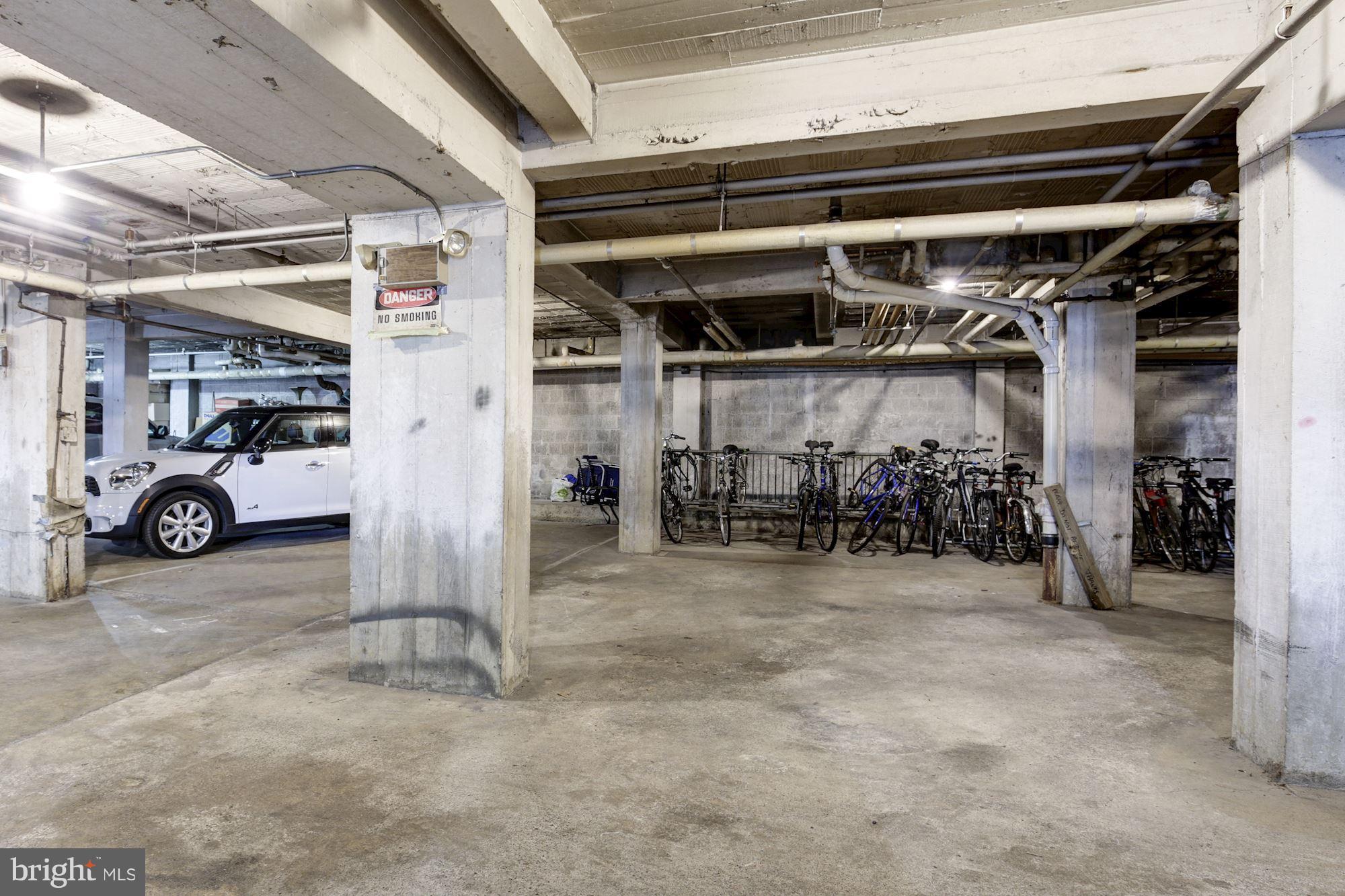 3025 Ontario Road Northwest, Unit 105 Washington, DC 20009 - Photo 24 of 26 a view of parking garage with cars