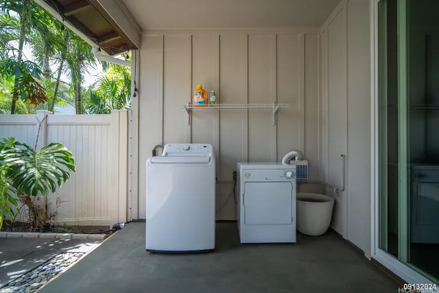 a house view with a backyard space