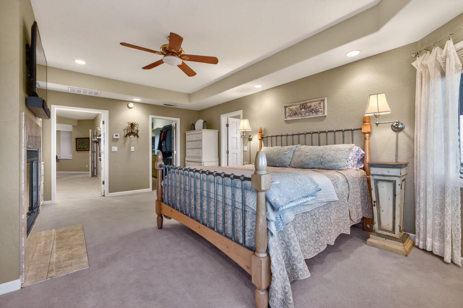 7570 Airola Road Vallecito, CA 95251 - Photo 40 of 90 a bed room with a bed and a walk in closet