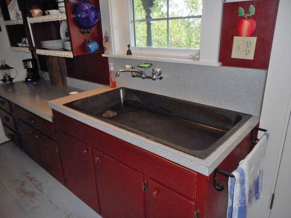 13 Old County Road Orland, ME 04472 - Photo 17 of 35 Low and wide farmer sink is cast iron!