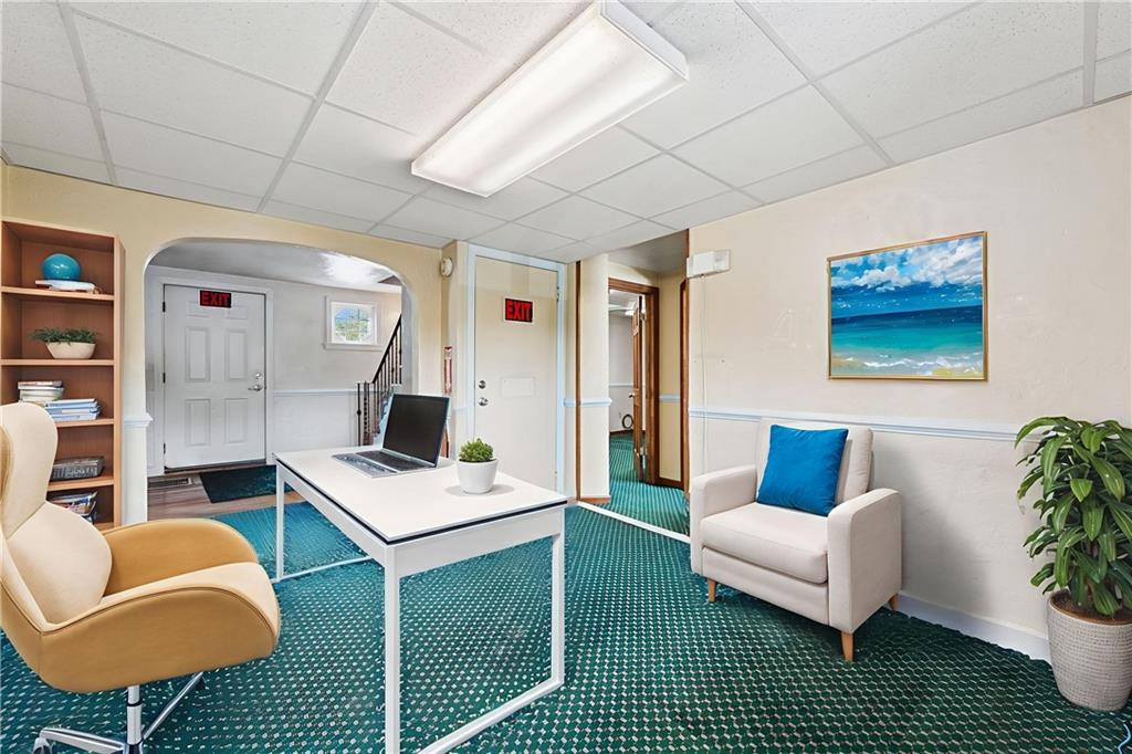 7814 Highway 30 Irwin, PA 15642 - Photo 11 of 30 a living room with furniture and a table