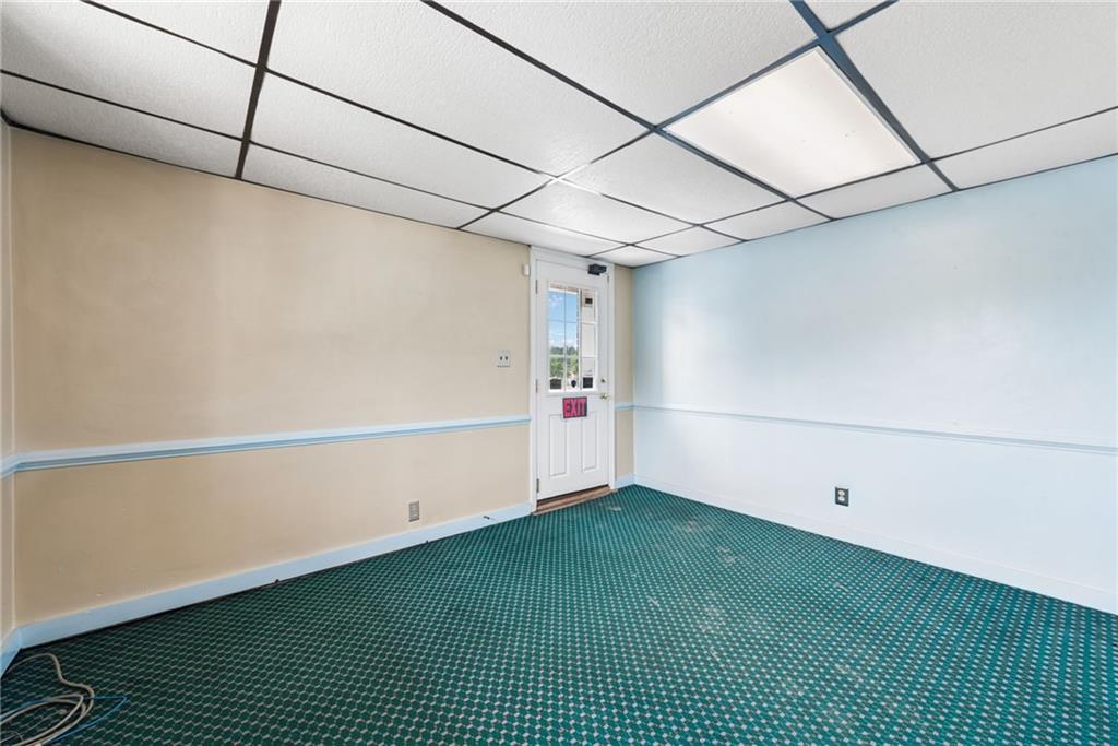 7814 Highway 30 Irwin, PA 15642 - Photo 23 of 30 a view of a room with an empty space and a window