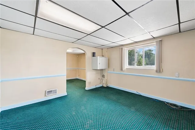 a bathroom with a sink and a shower