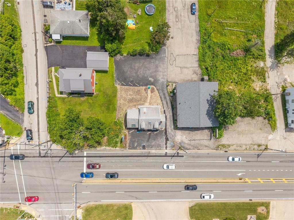 7814 Highway 30 Irwin, PA 15642 - Photo 27 of 30 an aerial view of residential houses with outdoor space