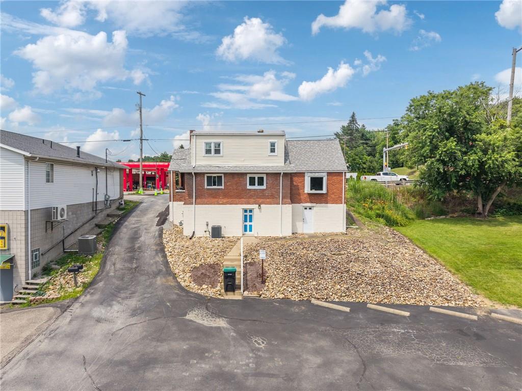 7814 Highway 30 Irwin, PA 15642 - Photo 28 of 30 a view of a house with a yard