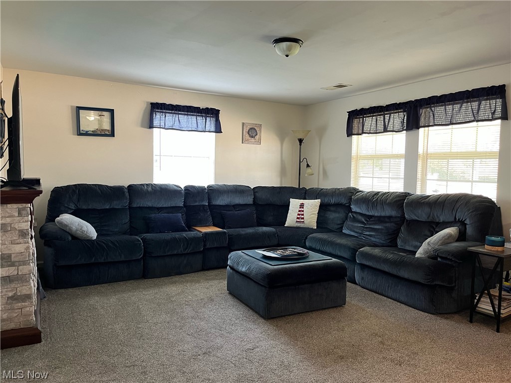 4972 West Fremont Road Port Clinton, OH 43452 - Photo 3 of 29 Living room with light carpet