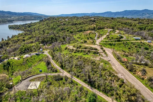 a view of a city with mountains in the background
