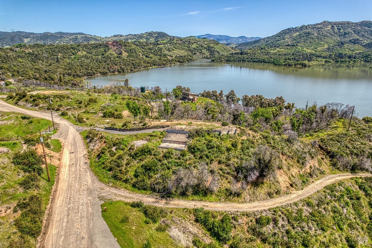5801 Lake Ridge Road Ukiah, CA 95482 - Photo 2 of 21 a view of a lake with a mountain