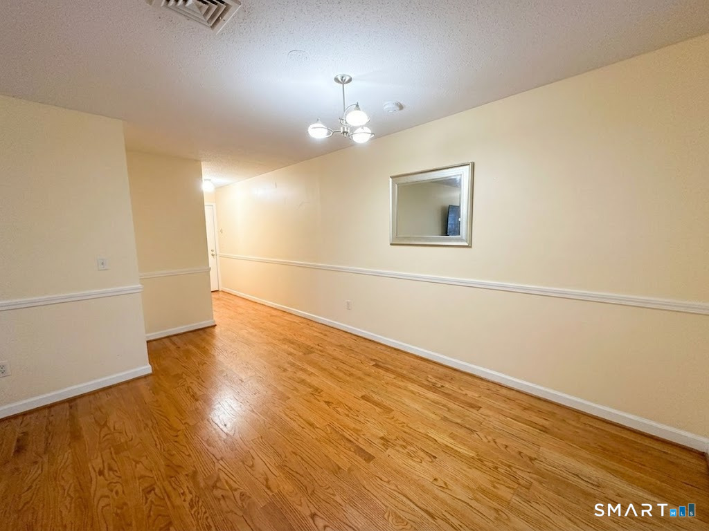 6 Concorde Way, Unit B4 Windsor Locks, CT 06096 - Photo 8 of 16 DINING AREA TO FRONT ENTRANCE