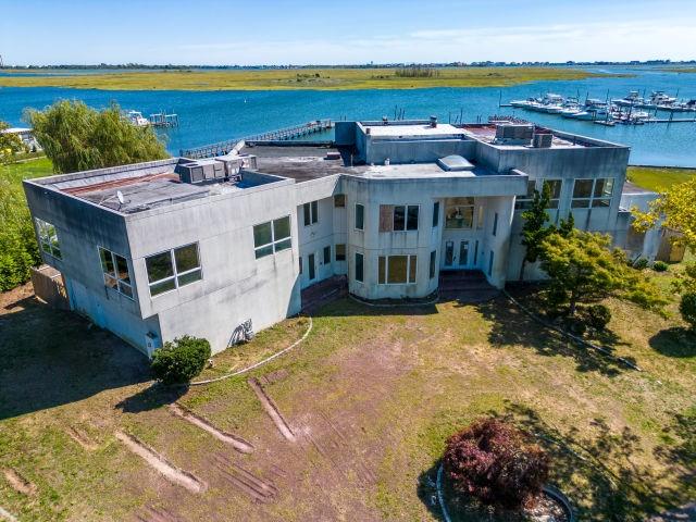 190 Priscilla Road Woodmere, NY 11598 - Photo 1 of 1 an aerial view of a house with a garden