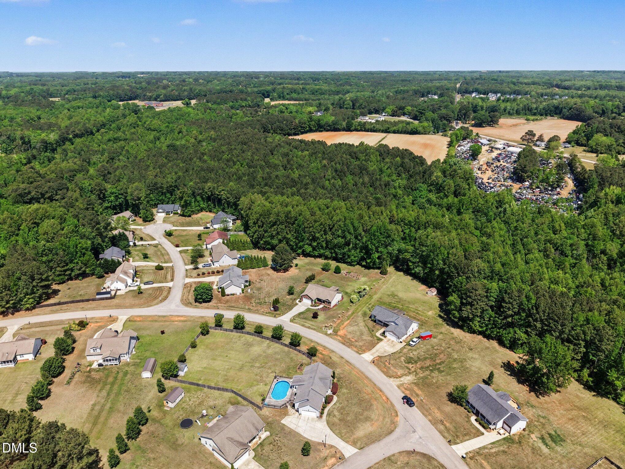 109 His Way Middlesex, NC 27557 - Photo 17 of 21 an aerial view of a house with outdoor space and lake view