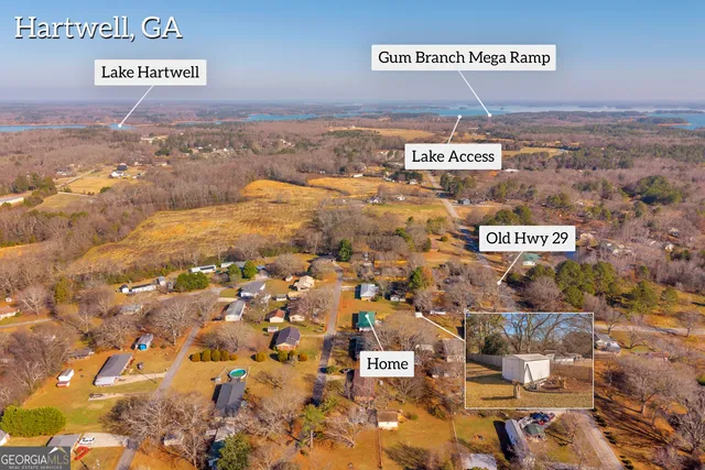 a view of a park with swings and slides