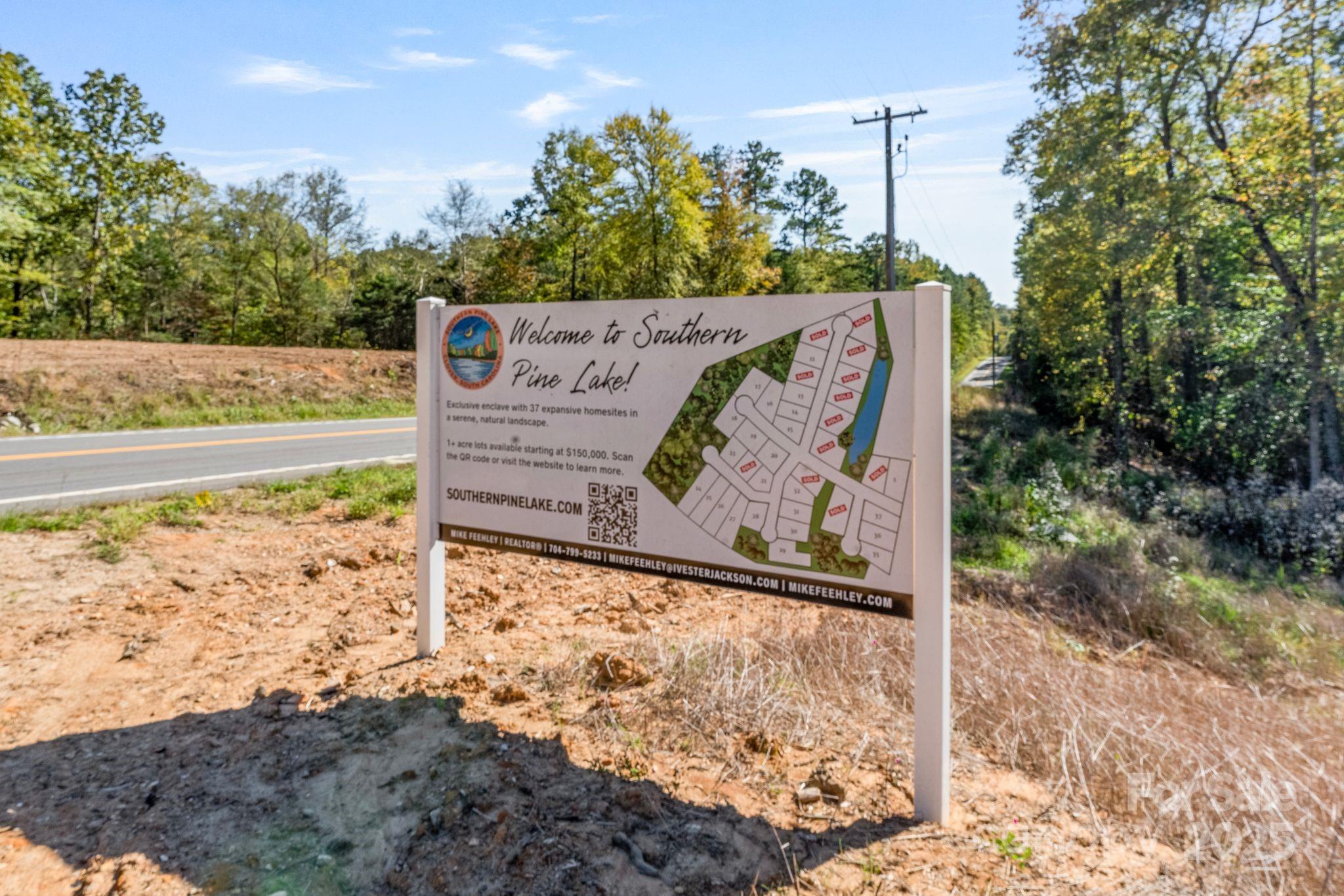 Lot 17 Great Blue Path Clover, SC 29710 - Photo 2 of 9 a view of a sign that is on the side of the road