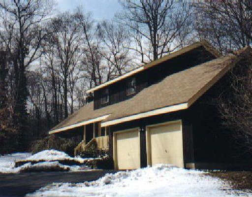 183 West Norwalk Road Norwalk, CT 06850 - Photo 1 of 1 a front view of a house with a yard