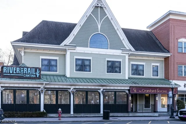 a view of a brick building with many windows