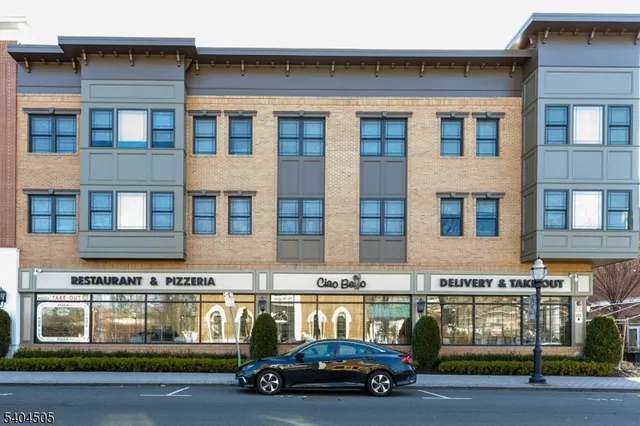 a car parked in front of a building